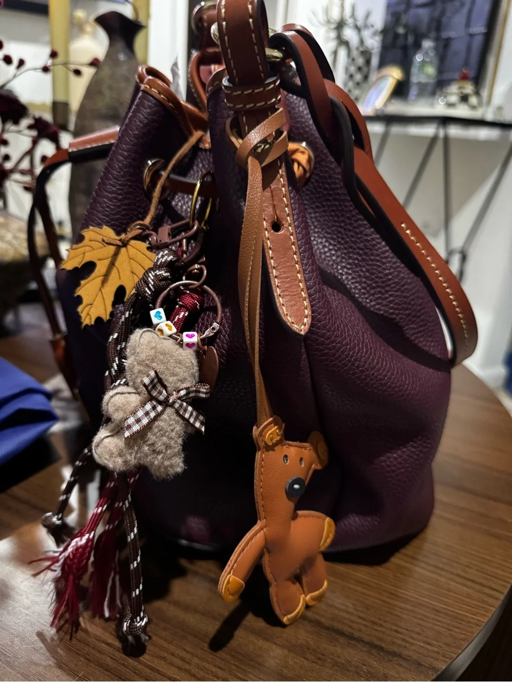 Dooney & Bourke Plum Pebbled Leather Drawstring Hobo with Tan Trim